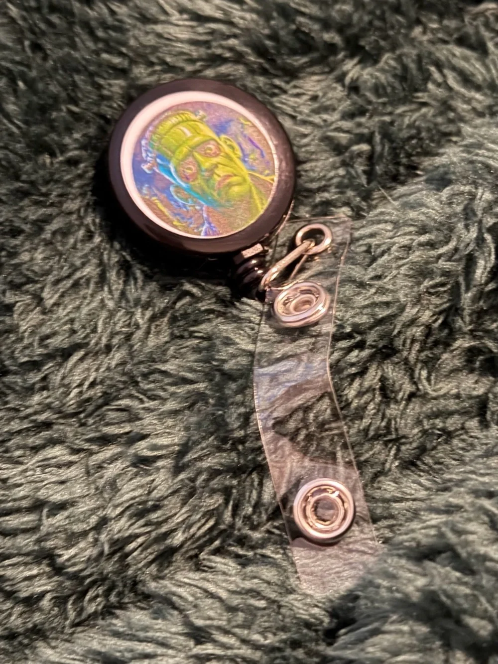 Black Retractable Badge Reel with Neon Holographic Design